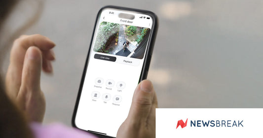 Smartphone displaying Lorex security app with live front door camera view, showing remote monitoring features, featured in NewsBreak’s article on security for remote living.